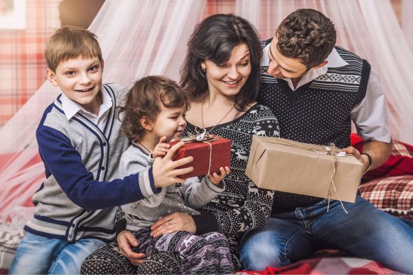 A family giving each other gifts